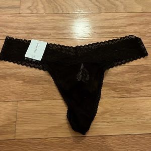 Brand new with tags Calvin Klein thong size medium